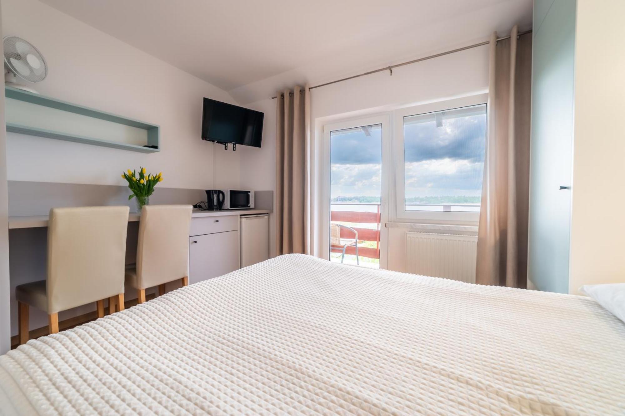 Apartamenty I Pokoje Seeblick Mikołajki Esterno foto
